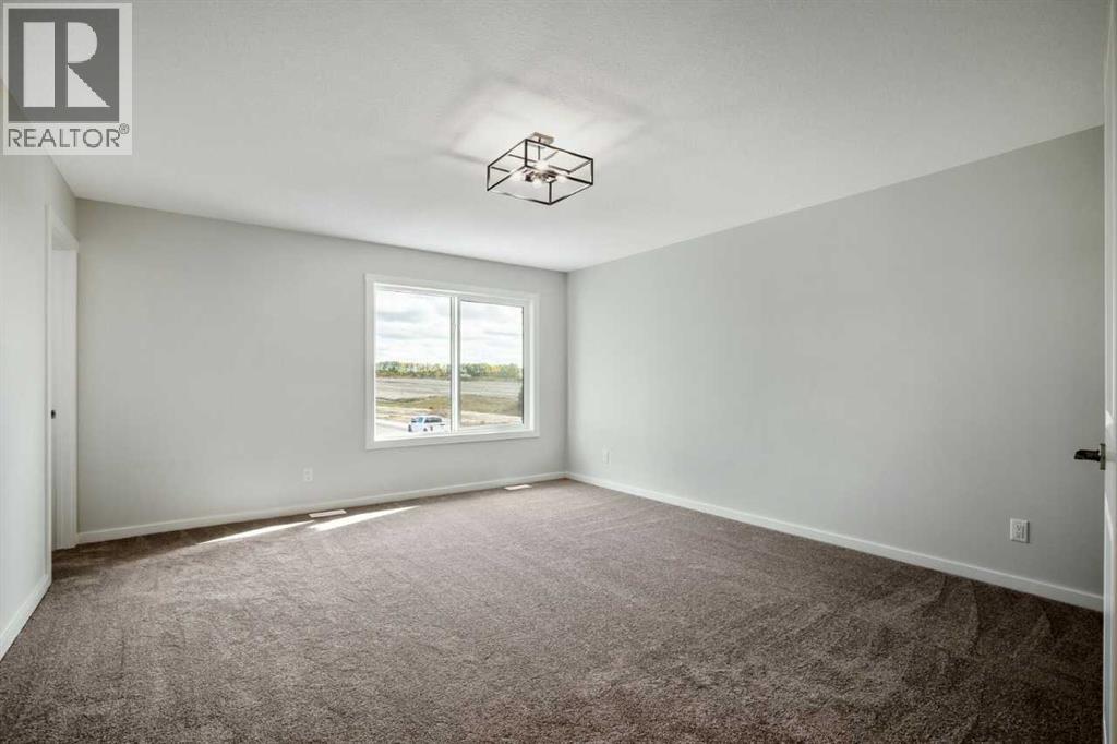 27 Heritage Link, Cochrane, Alberta  T4C 2J8 - Photo 19 - A2249127