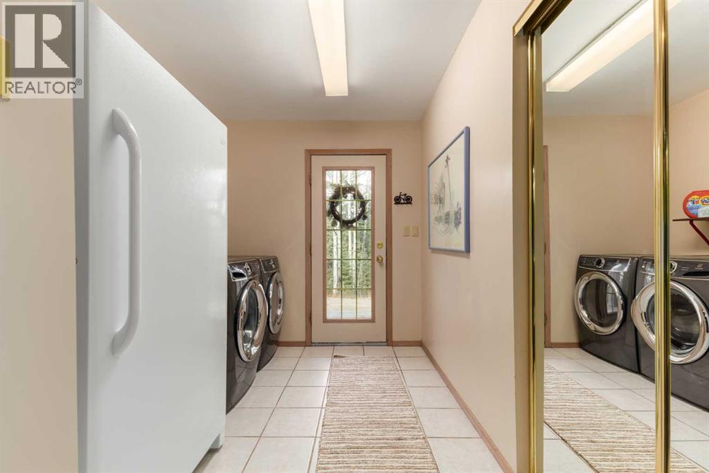 231031 Forestry Way, Bragg Creek, Alberta  T0L 0K0 - Photo 43 - A2270045