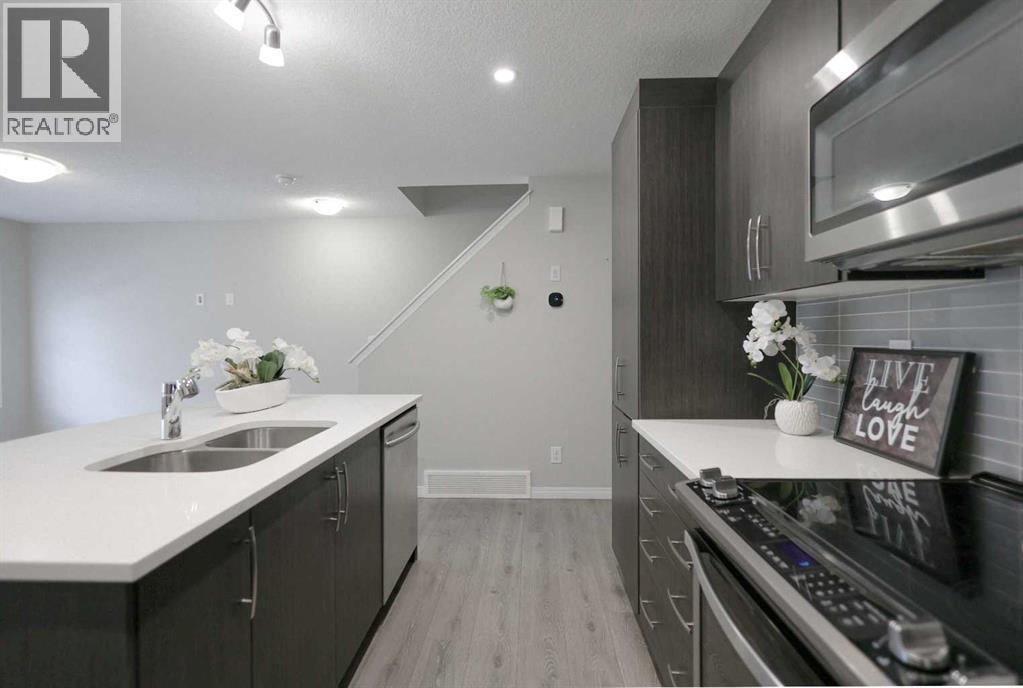 231 Windford Crescent Sw, Airdrie, Alberta  T4B 5E5 - Photo 6 - A2283120