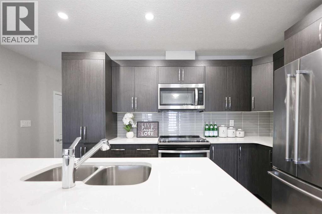 231 Windford Crescent Sw, Airdrie, Alberta  T4B 5E5 - Photo 3 - A2283120