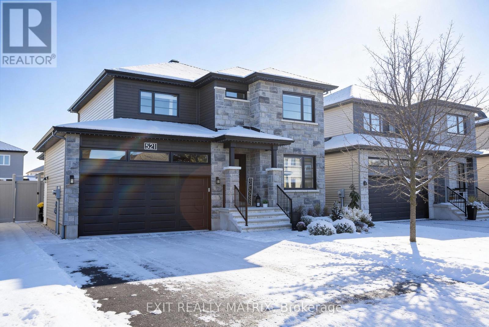 <div class="slider-price">$849,900</div><p>521 Marseille Street, Russell, Ontario</p>