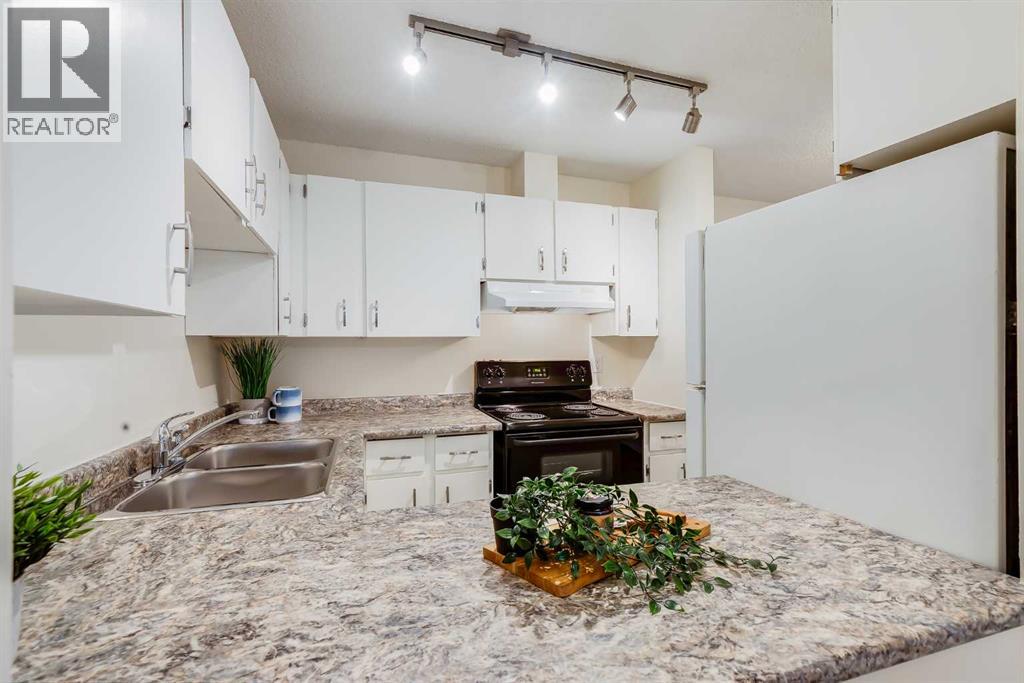 2466, 70 Glamis Drive Sw, Calgary, Alberta  T3E 6T6 - Photo 4 - A2282194