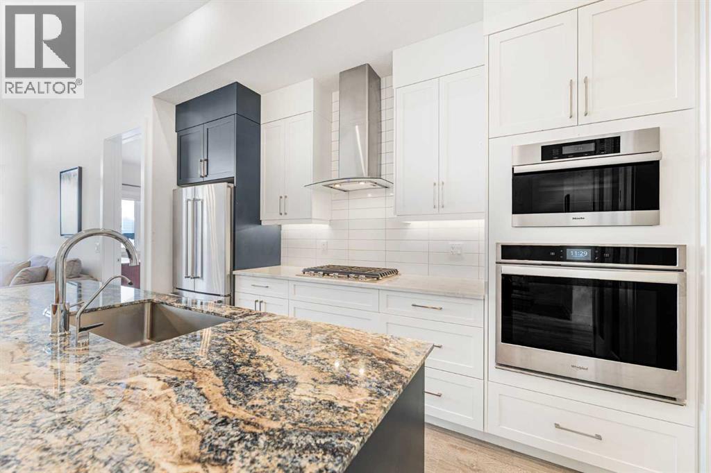 12572 Crestmont Boulevard Sw, Calgary, Alberta  T3B 6J5 - Photo 4 - A2277212