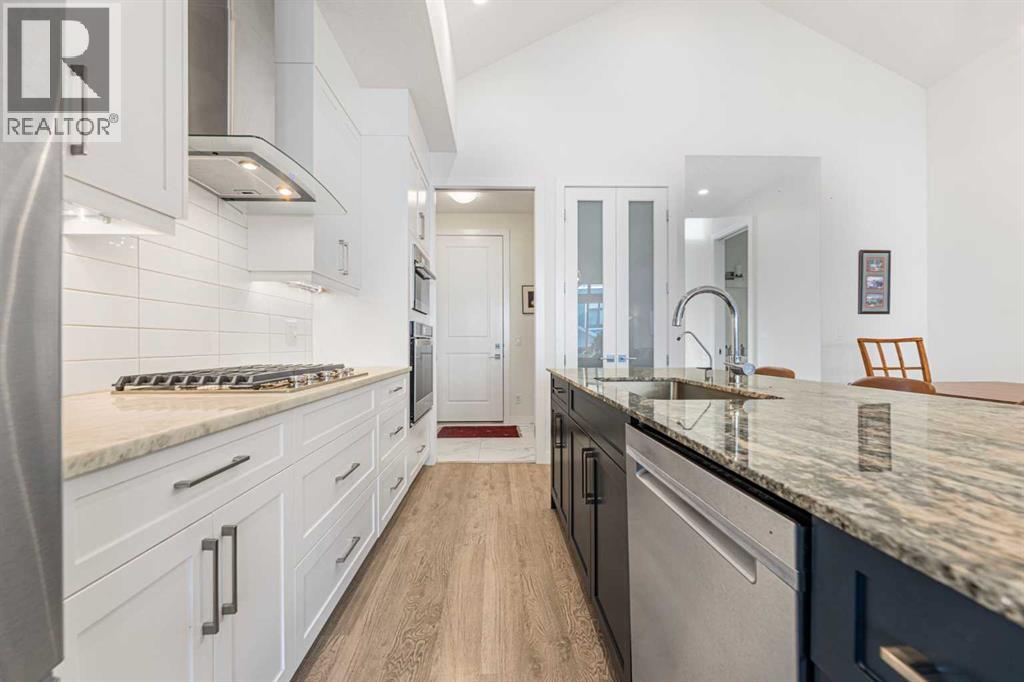 12572 Crestmont Boulevard Sw, Calgary, Alberta  T3B 6J5 - Photo 12 - A2277212