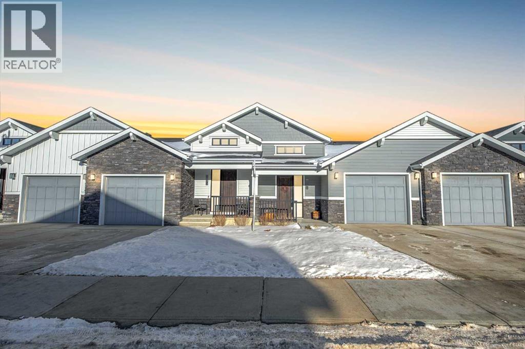 12572 Crestmont Boulevard Sw, Calgary, Alberta  T3B 6J5 - Photo 2 - A2277212