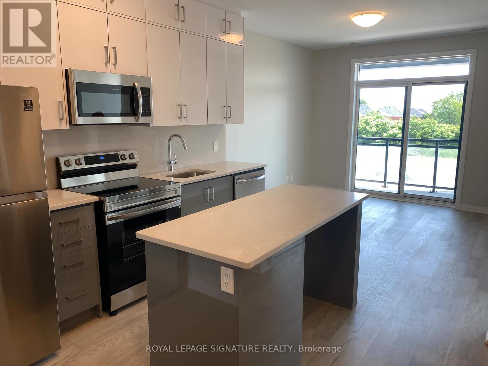 112 - 95 Dundas Street W, Oakville, Ontario  L5B 2T5 - Photo 6 - W12756852