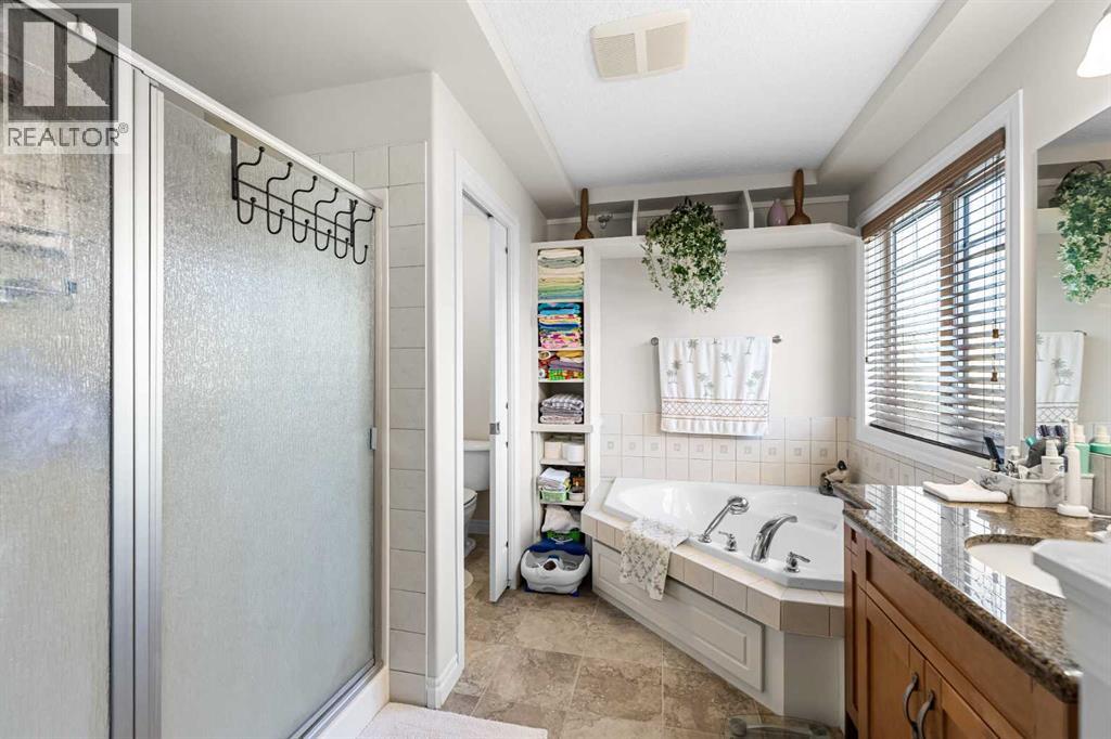 107 Panatella Close Nw, Calgary, Alberta  T3K 6C6 - Photo 25 - A2277383