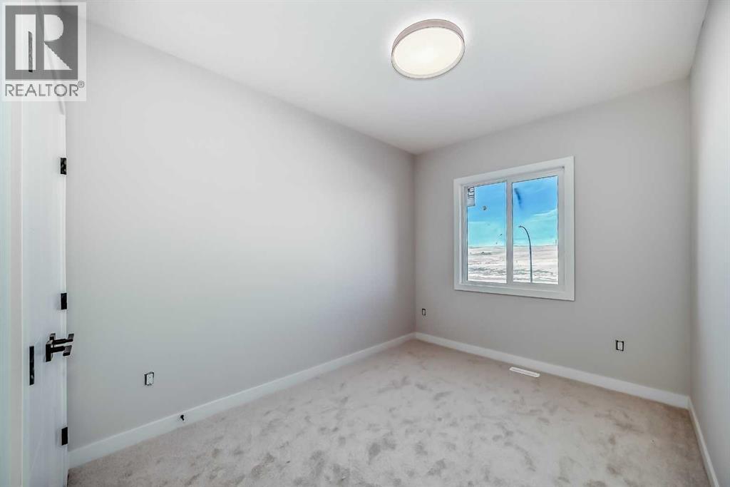 516 Heritage Boulevard, Cochrane, Alberta  T4C 2J8 - Photo 35 - A2277144