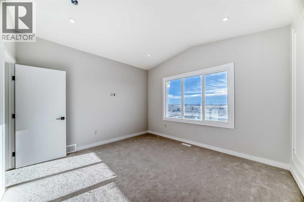 516 Heritage Boulevard, Cochrane, Alberta  T4C 2J8 - Photo 27 - A2277144