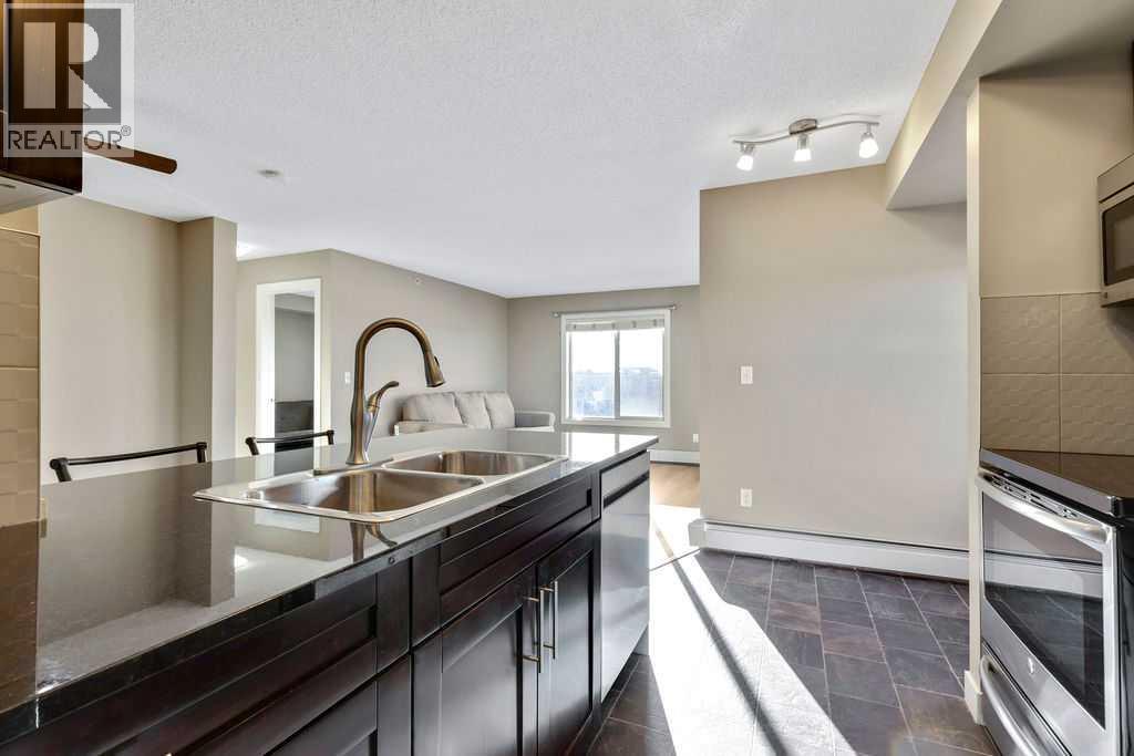 7402, 403 Mackenzie Way Sw, Airdrie, Alberta  T4B 3V7 - Photo 5 - A2278236