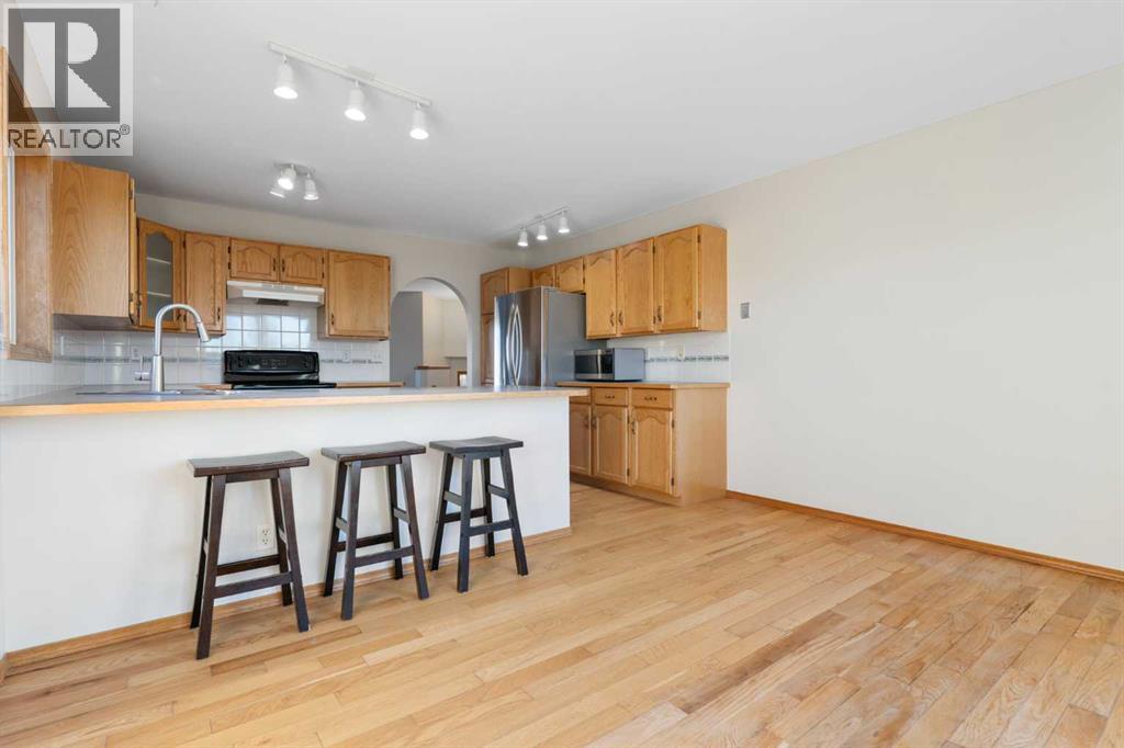 165 Quigley Drive, Cochrane, Alberta  T4C 1R4 - Photo 8 - A2281047