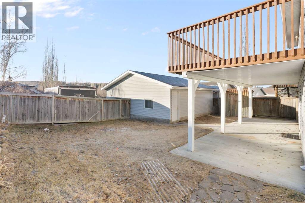 165 Quigley Drive, Cochrane, Alberta  T4C 1R4 - Photo 41 - A2281047