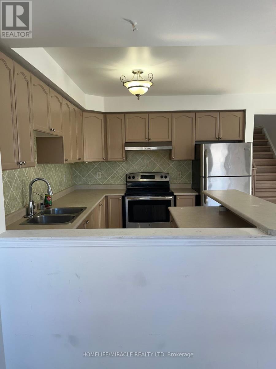 49 Sand Cherry Crescent, Brampton, Ontario  L6R 3B1 - Photo 7 - W12758652