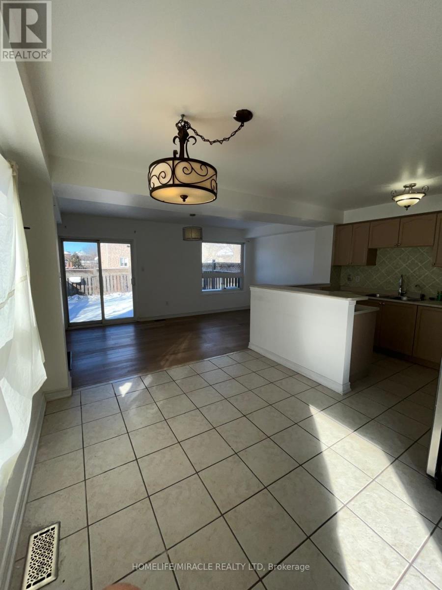 49 Sand Cherry Crescent, Brampton, Ontario  L6R 3B1 - Photo 9 - W12758652