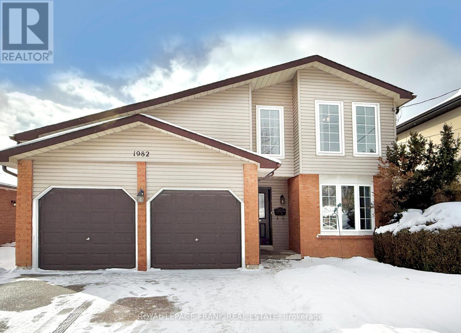Set on a large treed lot with a patio, this 4 bedroom home offers privacy, comfort and  a truly unique floorplan. The raised living room offers a woodburning fireplace, a walk-out to a balcony and a soaring cathedral ceiling. The sunken family room with a second fireplace creates a warm, inviting gathering place.  A beautifully renovated kitchen offers quartz countertops, stainless appliances and ample storage with pot drawers and 2 pantries. 4 bedrooms with spacious closets, offer privacy for everyone.  The main 4 pc bath has been upgraded.  The basement has a retro style rec room and direct walk-out to the yard;  an impressive layout should someone be looking to create an additional living space downstairs. Most windows and patio doors have been upgraded to vinyl units. Garage doors have been replaced. Furnace, 2023. Newer washer and dryer. Spacious double car garage offers direct entry to the home and a convenient side door to the yard. Location, Location: Featuring a high Walk Score with most services, and many restaurants, schools and transit very walkable from this address. Fireplaces as is - Seller used L/R fireplace only several times and F/R fireplace has not been used for many years.  If looking for style, comfort and great living spaces, do not miss this beauty. (id:48254)