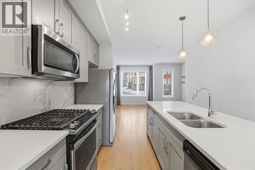 84 Shawnee Common Sw, Calgary, Alberta  T2Y 0P9 - Photo 6 - A2278103