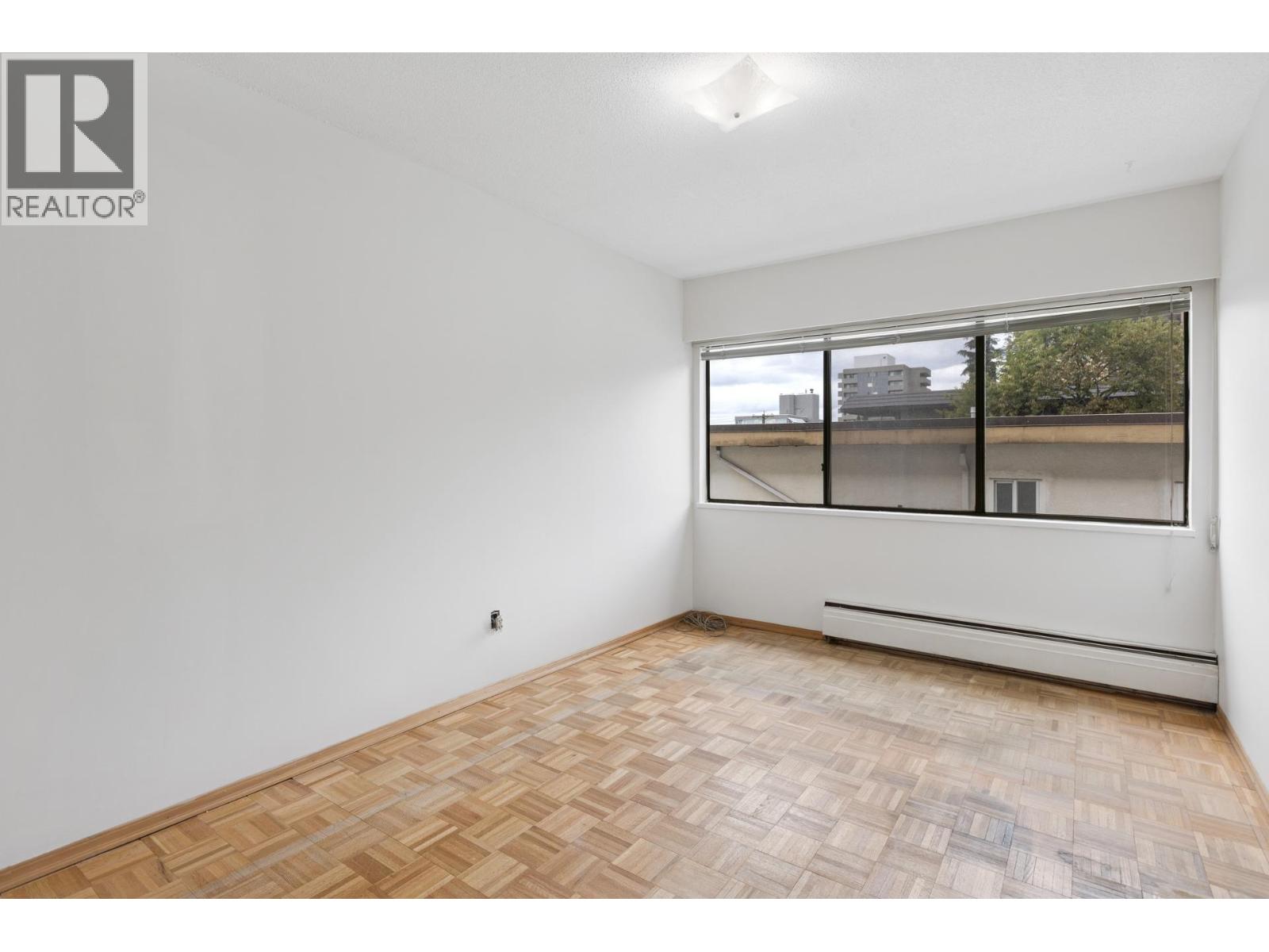 211 155 E 5th Street, North Vancouver, British Columbia  V7L 1L3 - Photo 13 - R3086654