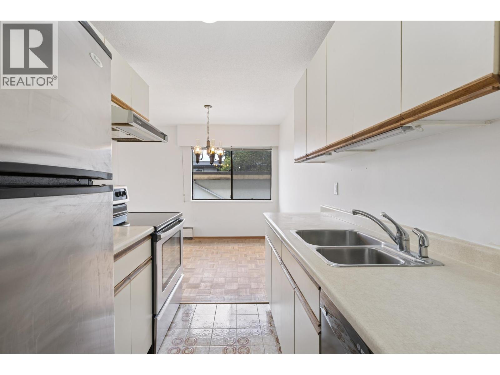 211 155 E 5th Street, North Vancouver, British Columbia  V7L 1L3 - Photo 7 - R3086654