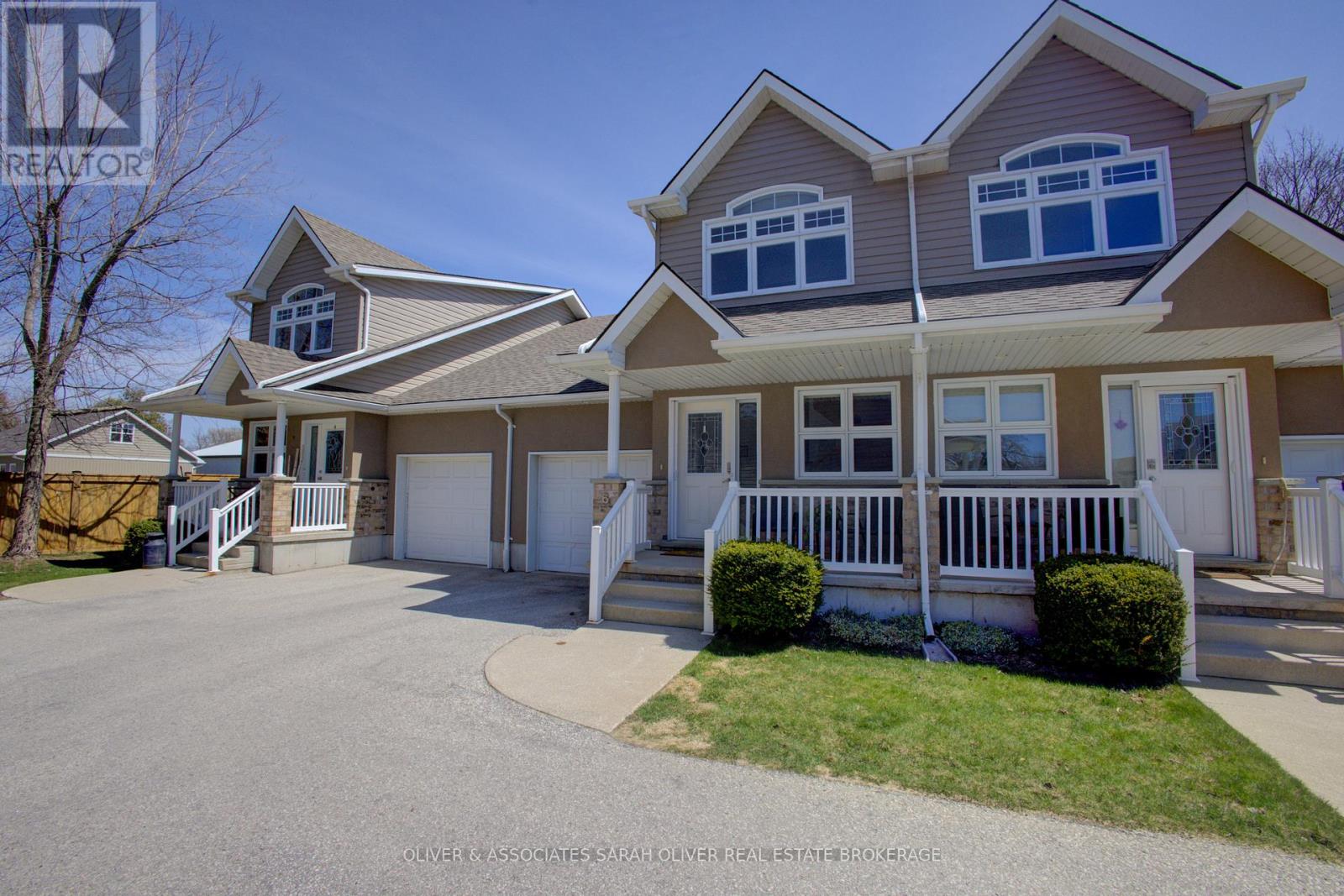 Step into easy, coastal living with this bright and cheerful condo townhome, tucked just a short walk less than two blocks from the stunning shores of Lake Huron. With only 11 homes in this quiet, well-kept community, you'll enjoy peaceful surroundings and walkable access to Kincardine's beaches, scenic trails, charming downtown, and lively year-round events. Inside, the impressive 16-foot ceiling in the foyer sets the tone for a space that feels open, fresh, and full of natural light an ideal blend of comfort and thoughtful design. It features 2 bedrooms, 3.5 bathrooms, a convenient main floor laundry, and a versatile loft that overlooks the living room and foyer. The comfortable living and dining areas boast a cathedral ceiling and a cozy gas fireplace, leading out to an outdoor area perfect for gatherings. This home is thoughtfully designed for easy one-level living and has been extensively updated in recent years. Upgrades include: The only unit in the complex with a skylight, offering more natural light. (January 2026) Brand new High Efficiency Furnace installed, (2022) Efficient 60-gallon water heater, (2023) Roof shingles replaced. One of the only units in the complex with a fully finished basement, built-in storage, and a 3-piece bathroom. Common elements are exterior components, landscaping / snow & building insurance. (id:48254)