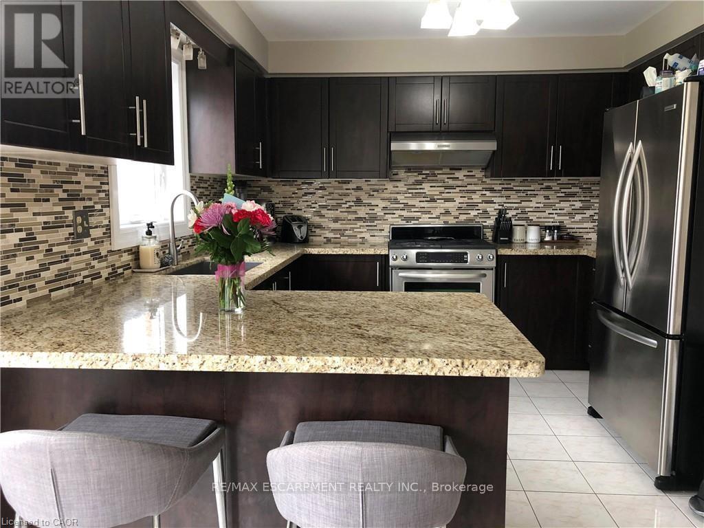 53 Laurendale Avenue, Hamilton, Ontario  L8B 0M6 - Photo 2 - X12754994