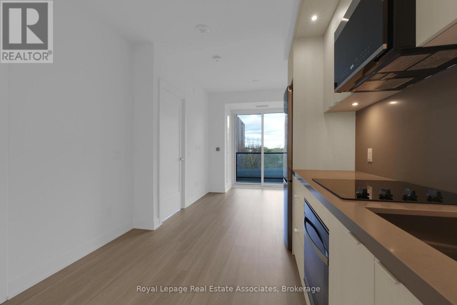 414 - 60 Central Park Roadway, Toronto, Ontario  M9A 3K1 - Photo 2 - W12759390