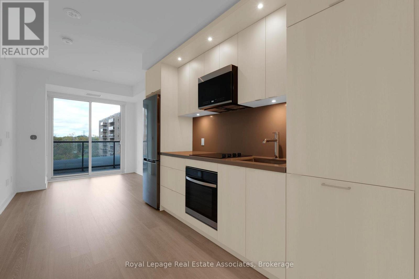 414 - 60 Central Park Roadway, Toronto, Ontario  M9A 3K1 - Photo 3 - W12759390