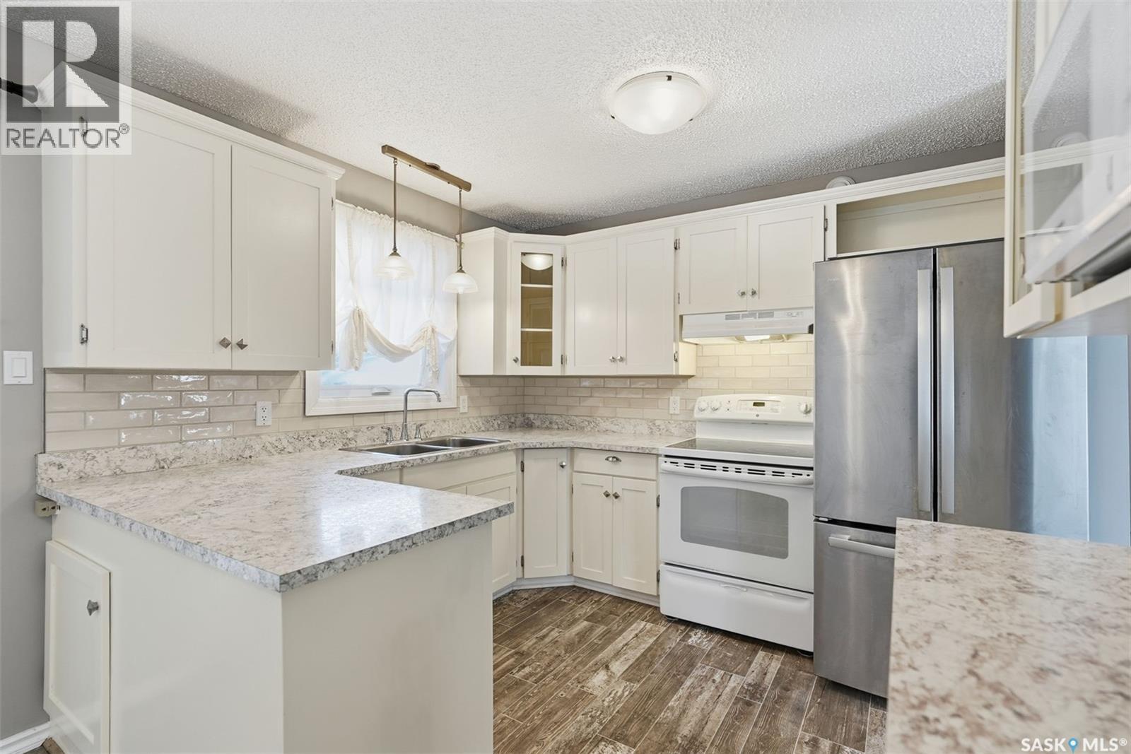 3441 12th Avenue E, Prince Albert, Saskatchewan  S6V 7G6 - Photo 13 - SK027898