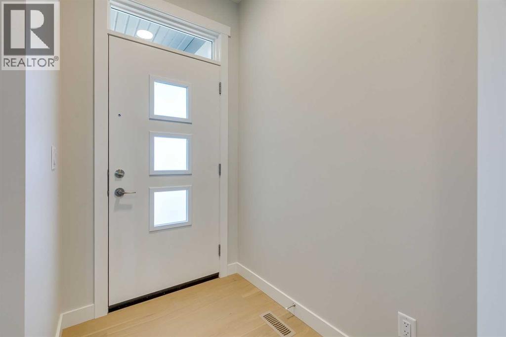 157 Wolf Hollow Drive Se, Calgary, Alberta  T2X 6C4 - Photo 3 - A2268799