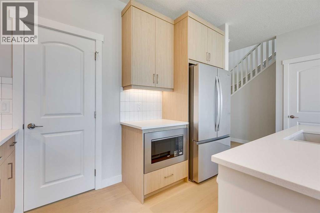 157 Wolf Hollow Drive Se, Calgary, Alberta  T2X 6C4 - Photo 9 - A2268799