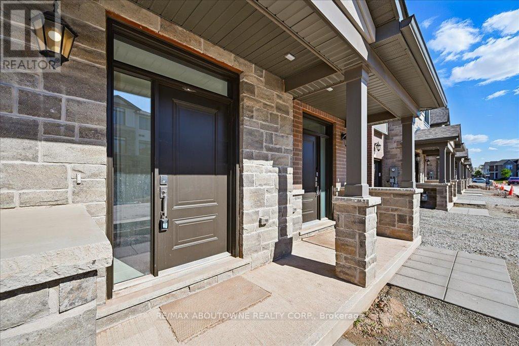 13 - 2184 Postmaster Drive, Oakville, Ontario  L6M 3X1 - Photo 3 - W12759476