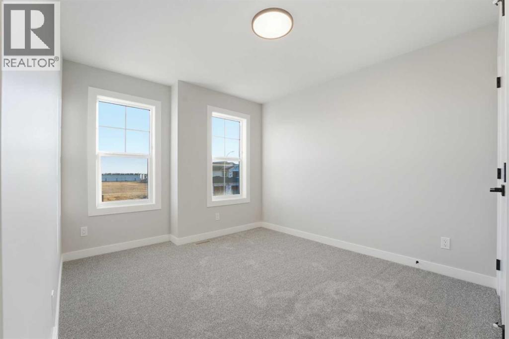 62 Vista Close, Blackfalds, Alberta  T4M 0L3 - Photo 37 - A2225489