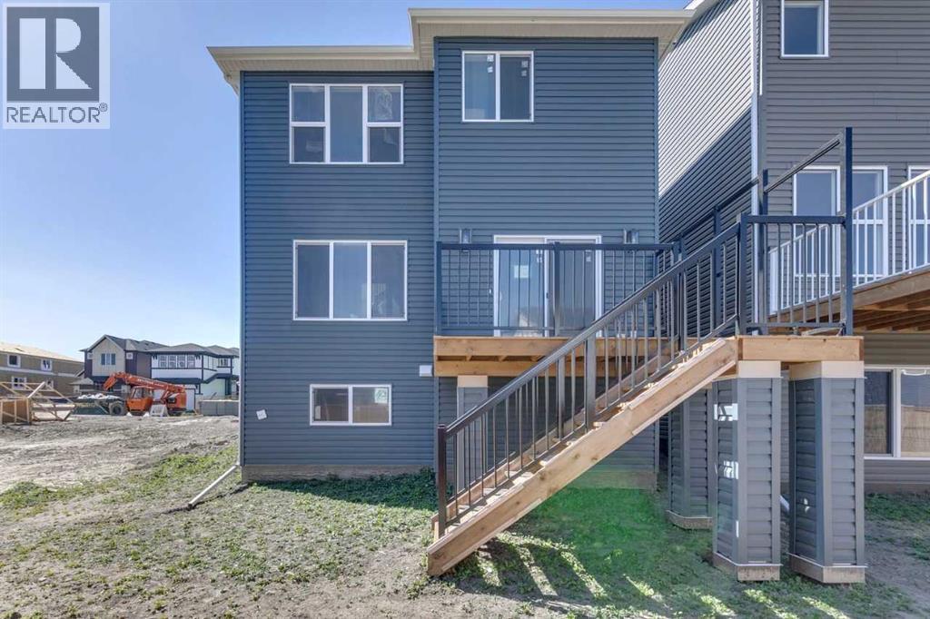 92 Amblefield Grove Nw, Calgary, Alberta  T3P 2L4 - Photo 3 - A2278305