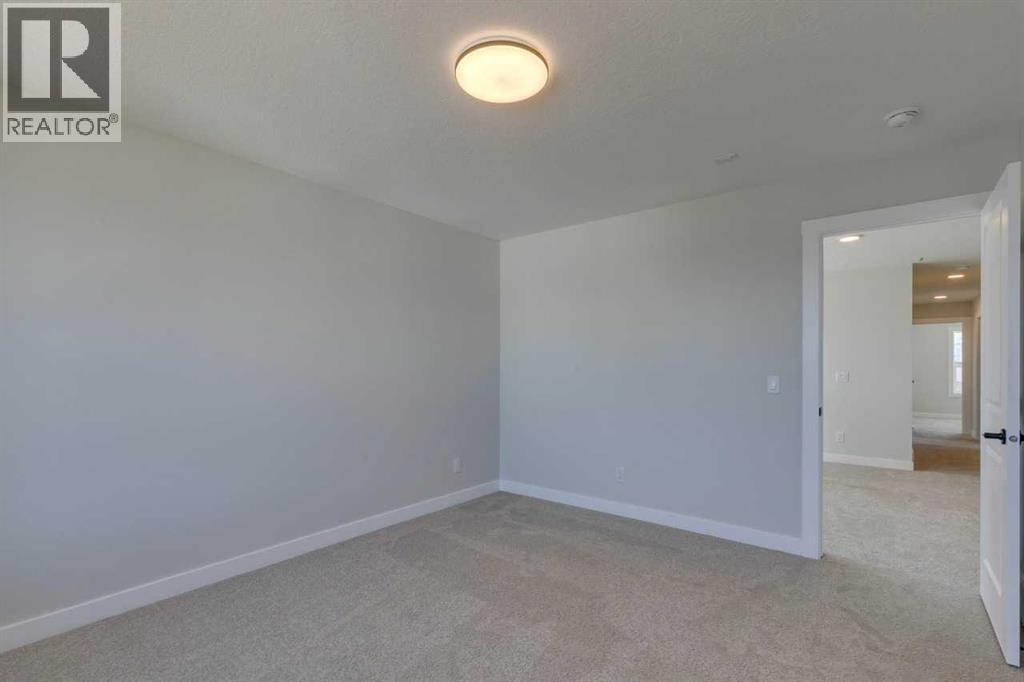 92 Amblefield Grove Nw, Calgary, Alberta  T3P 2L4 - Photo 11 - A2278305