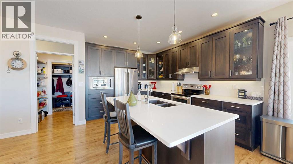 4020 Monarch Way, Stettler, Alberta  T4K 1M4 - Photo 5 - A2283492