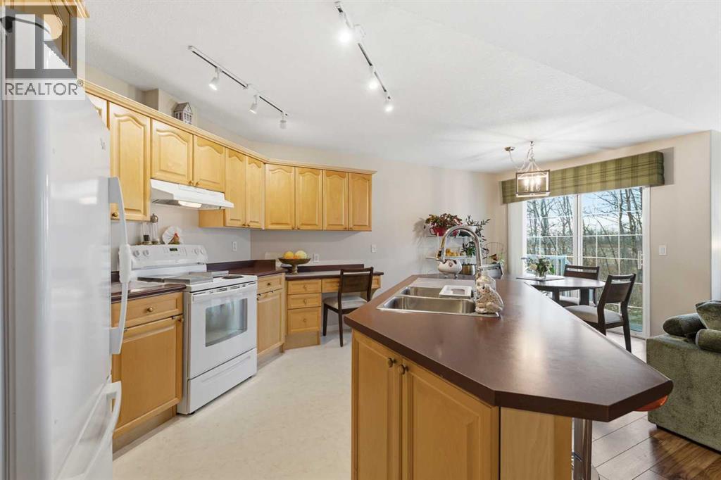 213 Dayspring Bay, Rural Rocky View County, Alberta  T1X 1G3 - Photo 8 - A2268926