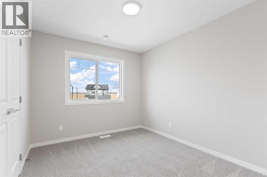 114 Monterey Bay Se, High River, Alberta  T1V 0K3 - Photo 25 - A2267762