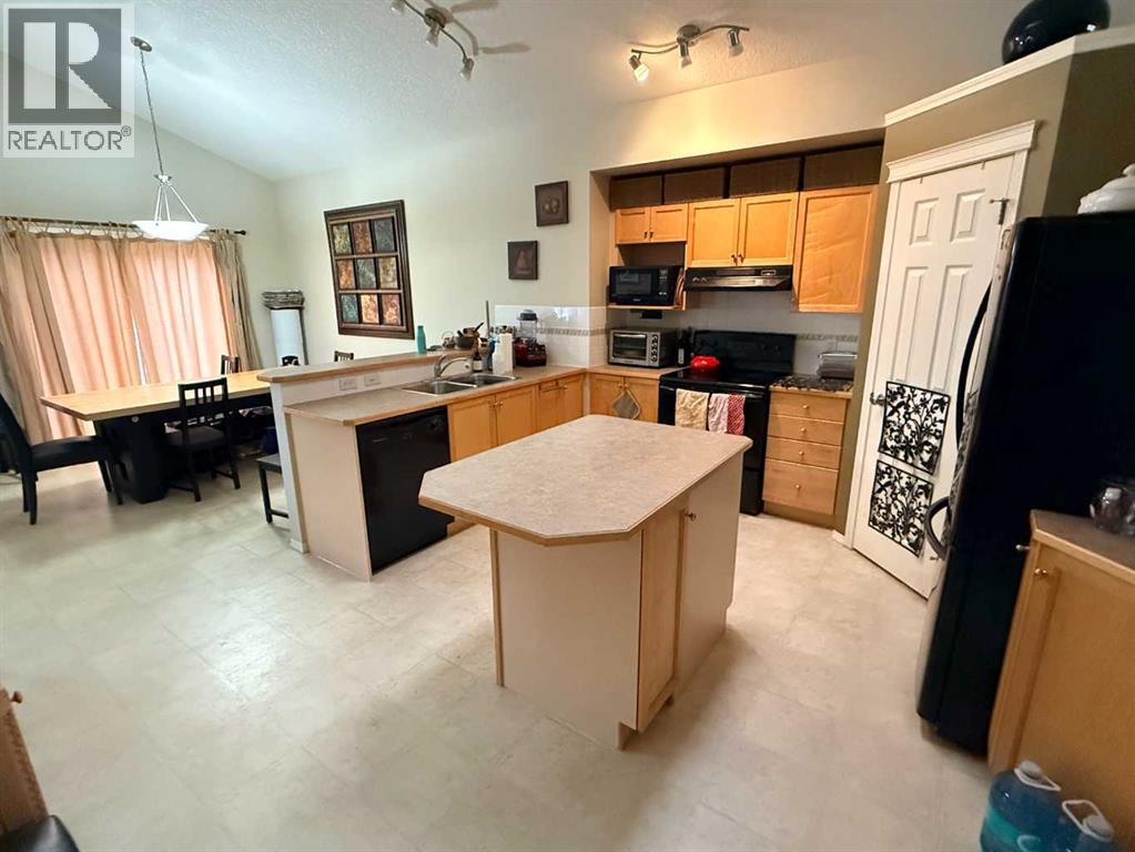 61 Everwoods Close Sw, Calgary, Alberta  T2Y 5A6 - Photo 4 - A2271516