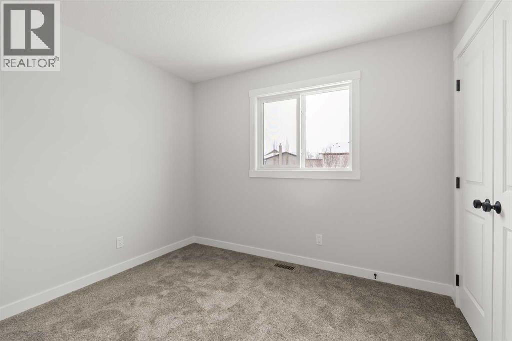 219 Silver Spruce Grove Sw, Calgary, Alberta  T2X 5M2 - Photo 39 - A2283857