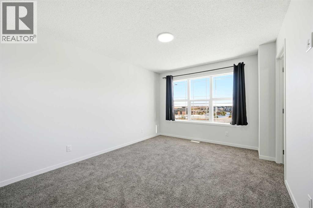 185 Edith Green Nw, Calgary, Alberta  T3R 2H2 - Photo 20 - A2281548