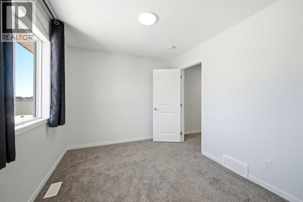 185 Edith Green Nw, Calgary, Alberta  T3R 2H2 - Photo 28 - A2281548