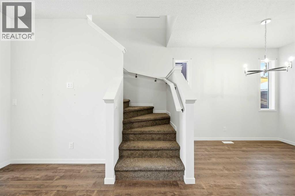 185 Edith Green Nw, Calgary, Alberta  T3R 2H2 - Photo 17 - A2281548