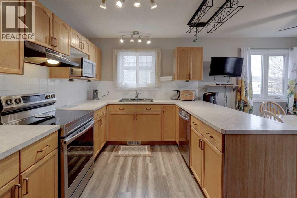 411 Strathford Boulevard, Strathmore, Alberta  T1P 1P2 - Photo 12 - A2283344