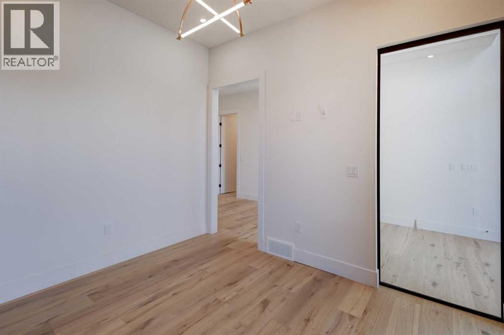 1436 Coopers Landing Sw, Airdrie, Alberta  T4B 0G6 - Photo 6 - A2261830