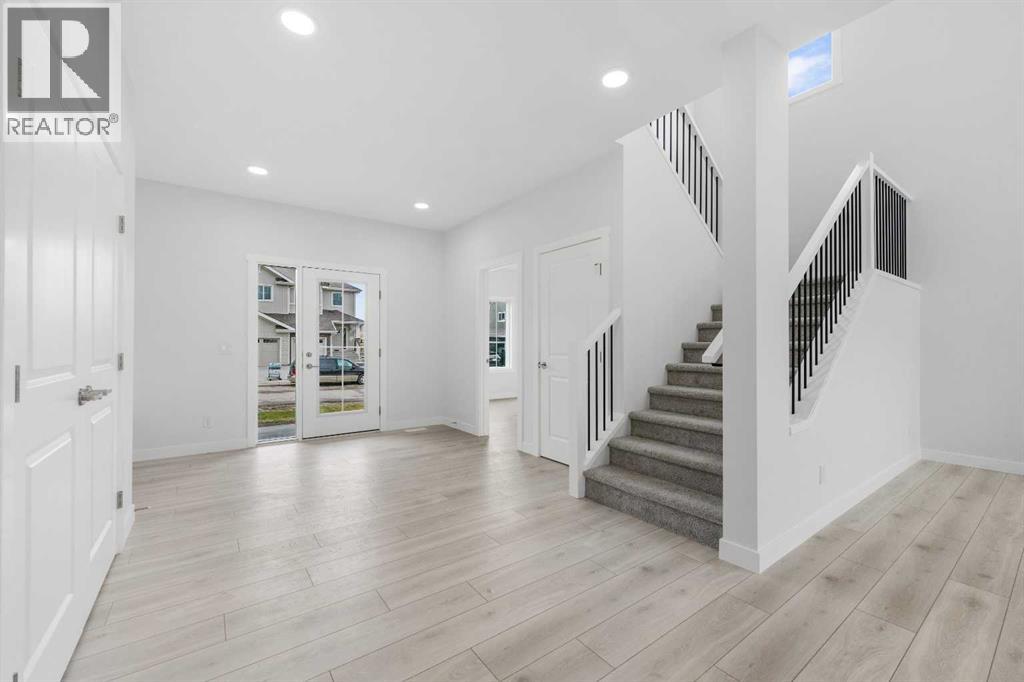 142 Sunstone Way, Balzac, Alberta  T4B 5T5 - Photo 3 - A2279271