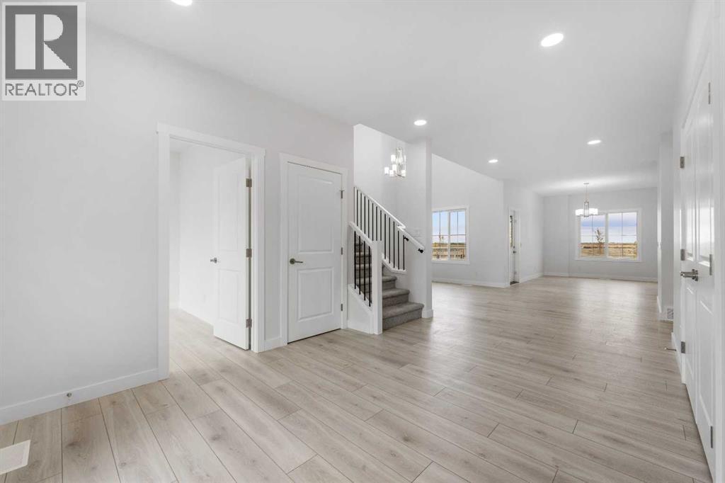 142 Sunstone Way, Balzac, Alberta  T4B 5T5 - Photo 5 - A2279271