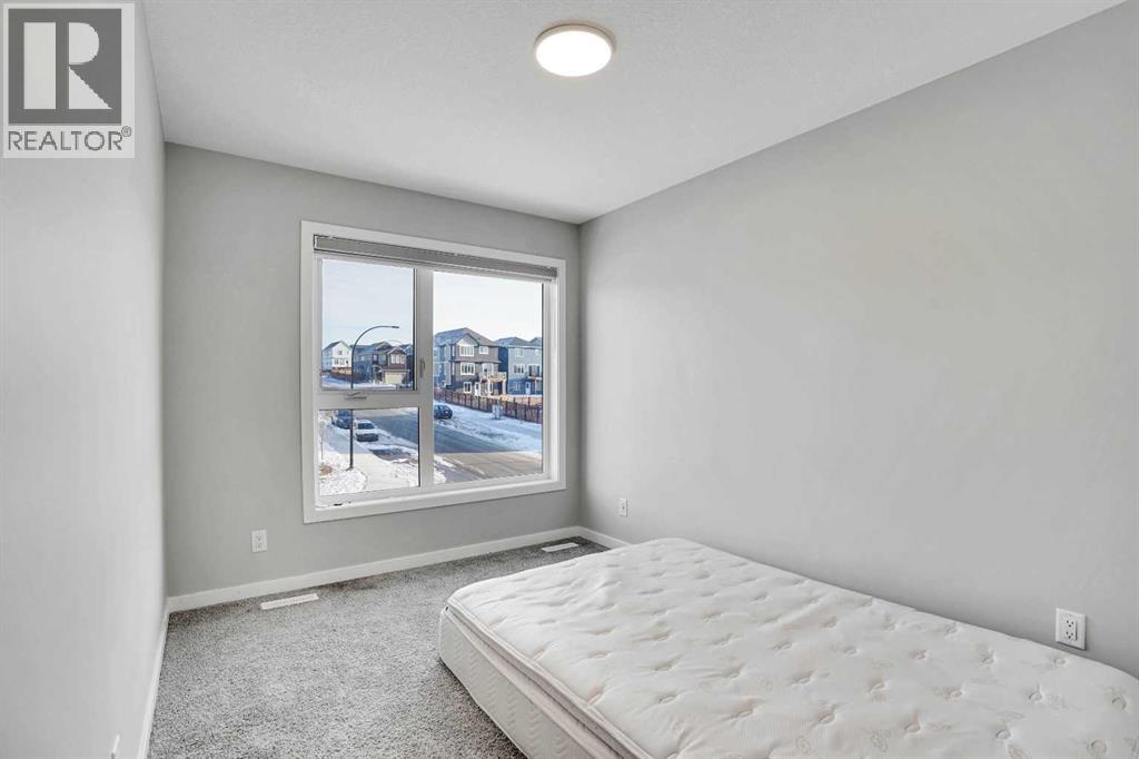 210 Lucas Close Nw, Calgary, Alberta  T3P 1Z4 - Photo 7 - A2284126