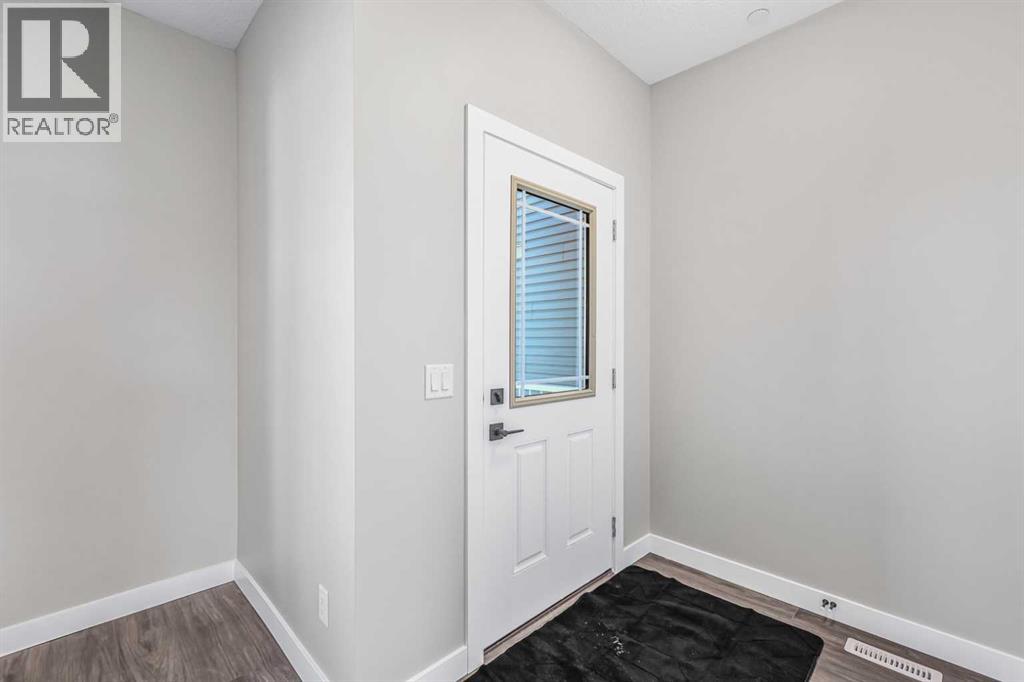 423 Hotchkiss Manor, Calgary, Alberta  T3S 0N3 - Photo 4 - A2283550