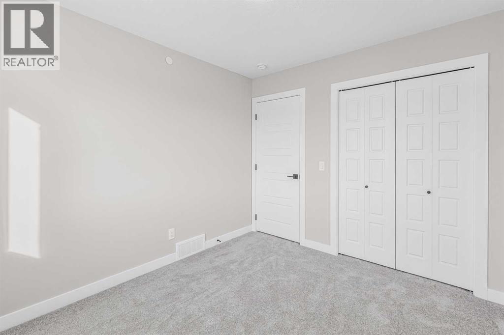 423 Hotchkiss Manor, Calgary, Alberta  T3S 0N3 - Photo 34 - A2283550