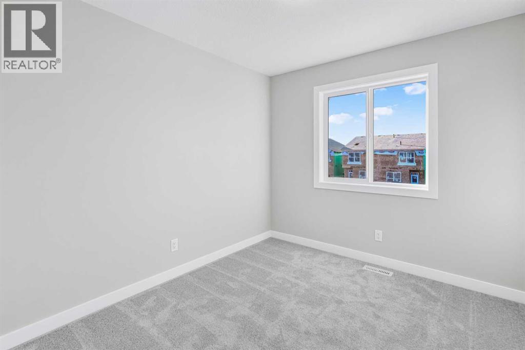 423 Hotchkiss Manor, Calgary, Alberta  T3S 0N3 - Photo 33 - A2283550