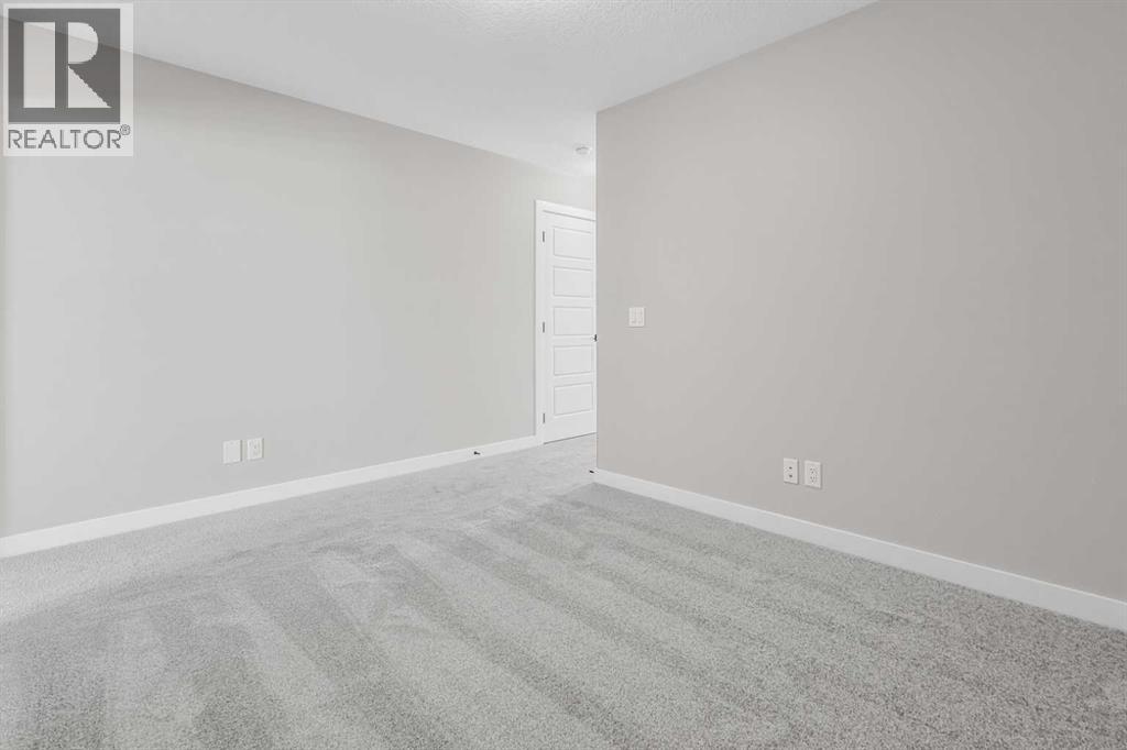 423 Hotchkiss Manor, Calgary, Alberta  T3S 0N3 - Photo 24 - A2283550